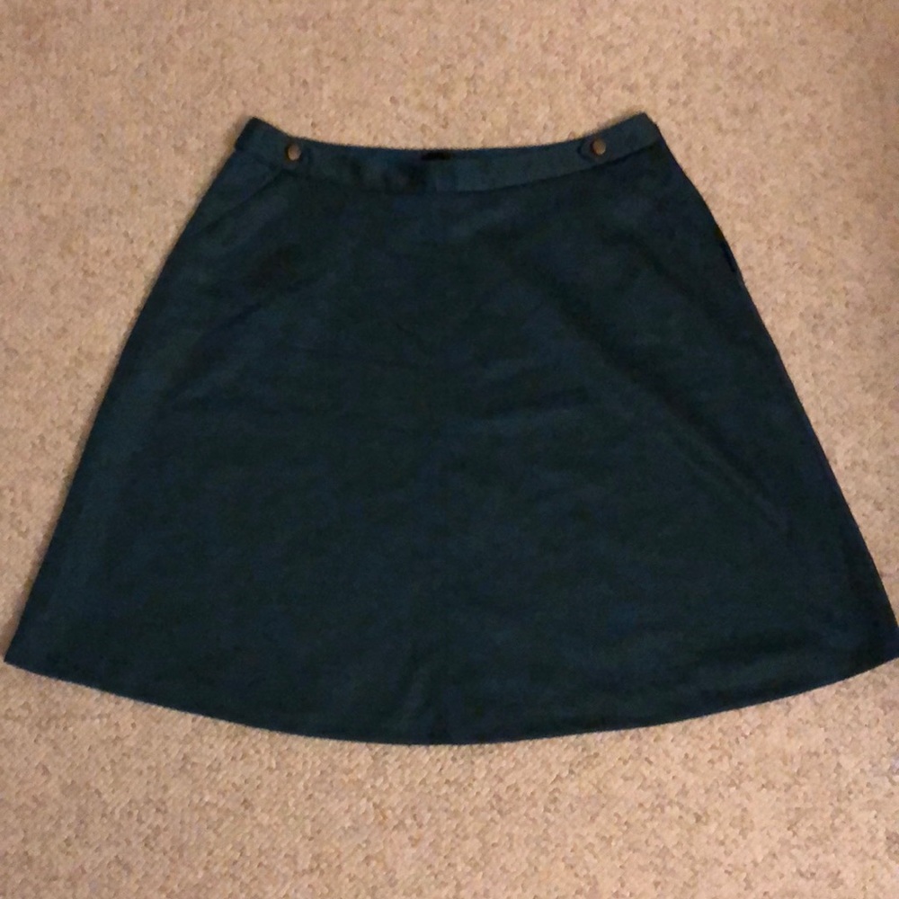 Dark green knee length skirt